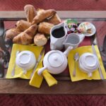 Photo montrant Vue un petit déjeuner sur la page appartements de l'hôtel la pergola